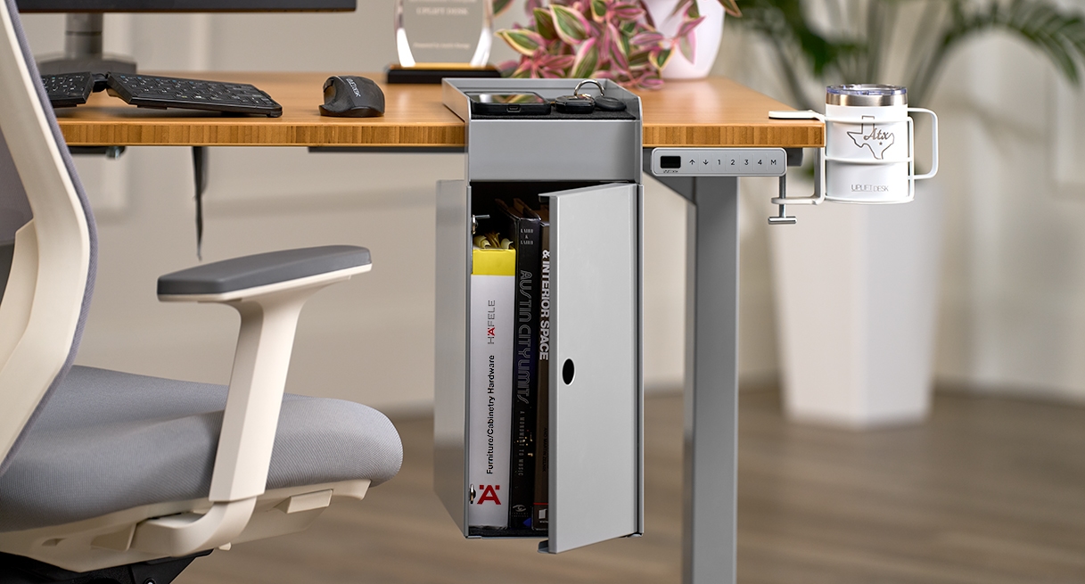 A gray hanging storage cubby with a matching door holding books inside