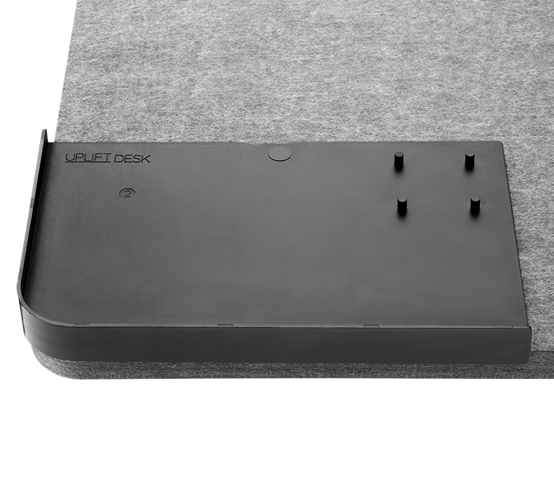 The hole finder tool aligns with the Acoustic Privacy Panel corner