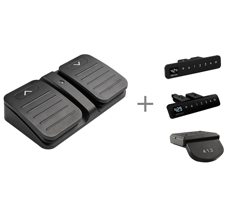 A Wireless Foot Switch beside all three UPLIFT Desk Advanced Keypads