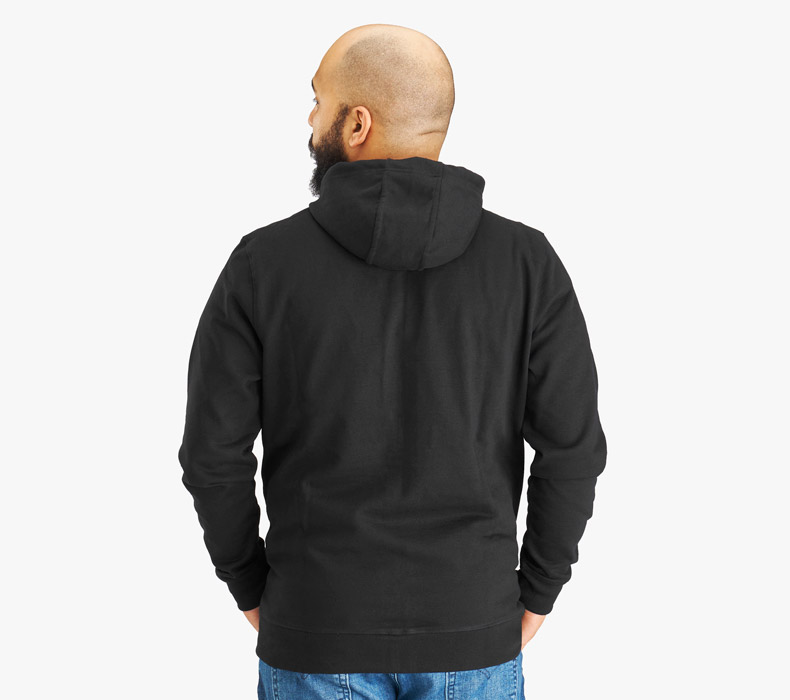 A reverse view of a person wearing a black UPLIFT Desk Full Zip Hoodie