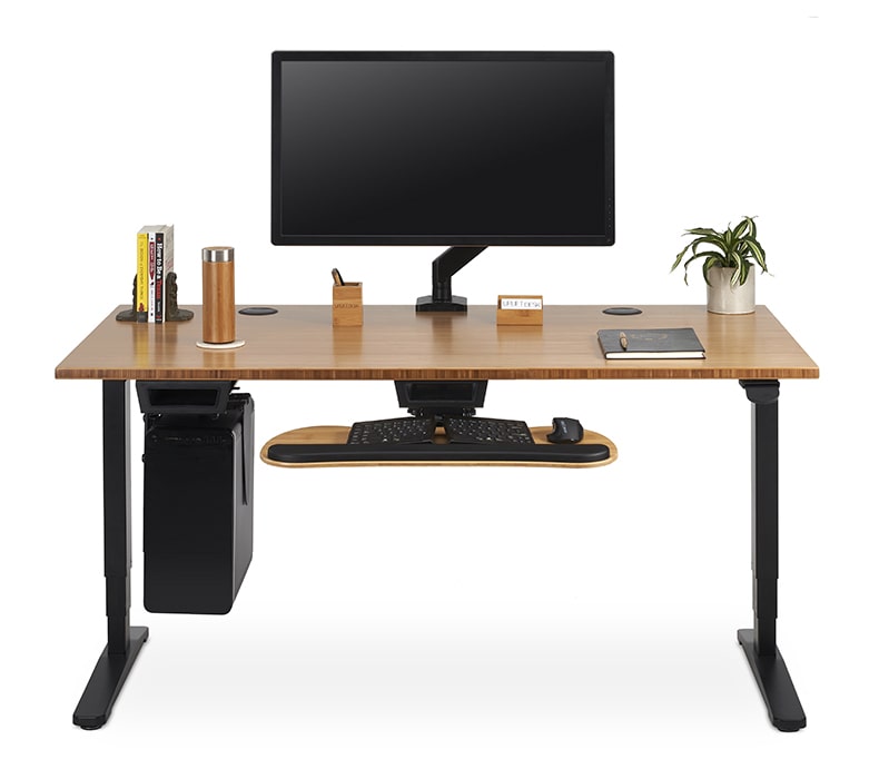 Crestview Single Monitor Arm clamped to a 60" x 30" Bamboo UPLIFT Standing Desk