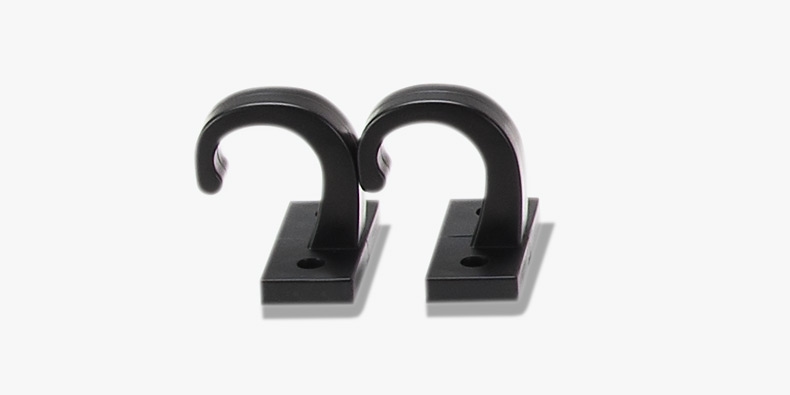 A pair of UPLIFT Desk accessory hooks.