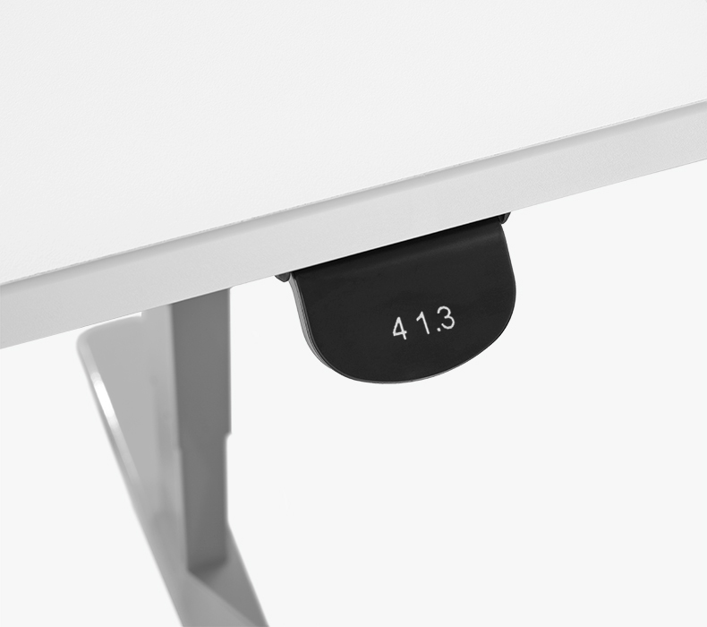 A close-up of an Advanced Paddle Keypad displaying standing desk height