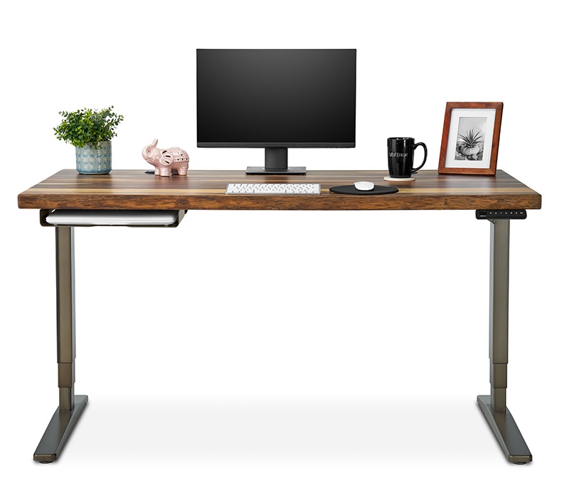 A Slim Under Desk Shelf mounted to an UPLIFT V2 Standing Desk with pheasantwood desktop