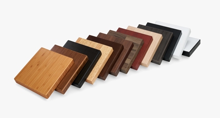 A variety of solid wood and laminate desktop samples