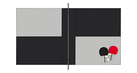 Overview of the checkerboard laminate pattern on the table tennis conference table, shown with net, balls, and paddles